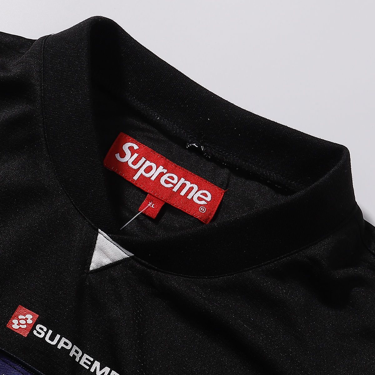 Supreme Black Soccer-Inspired Jersey Graphic T-Shirt